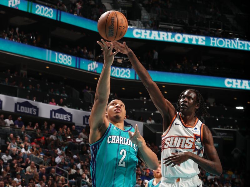 CHARLOTTE, NC - MARCH 15: Grant Williams #2 of the Charlotte Hornets drives to the basket during the game against the Phoenix Suns on March 15, 2024 at Spectrum Center in Charlotte, North Carolina. NOTE TO USER: User expressly acknowledges and agrees that, by downloading and or using this photograph, User is consenting to the terms and conditions of the Getty Images License Agreement. Mandatory Copyright Notice: Copyright 2024 NBAE (Photo by Kent Smith/NBAE via Getty Images)