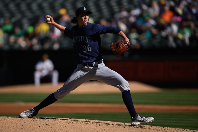 Sep 2, 2024; Oakland, California, USA; Seattle Mariners starting pitcher Logan Gilbert (36) throws against the Oakland Athletics in the first inning at Oakland-Alameda County Coliseum. Mandatory Credit: Eakin Howard-USA TODAY Sports