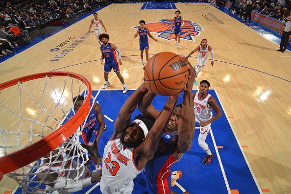 NEW YORK, NY - NOVEMBER 30: Mitchell Robinson #23 of the New York Knicks rebounds the ball during the game against the Detroit Pistons on November 30, 2023 at Madison Square Garden in New York City, New York.  NOTE TO USER: User expressly acknowledges and agrees that, by downloading and or using this photograph, User is consenting to the terms and conditions of the Getty Images License Agreement. Mandatory Copyright Notice: Copyright 2023 NBAE  (Photo by Jesse D. Garrabrant/NBAE via Getty Images)