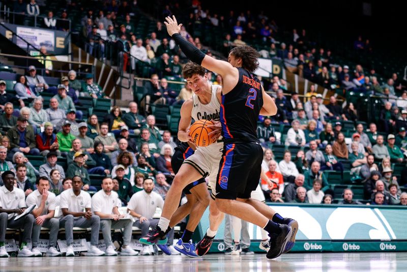 Feb 15, 2023; Fort Collins, Colorado, USA; Colorado State Rams forward Patrick Cartier (12) drives to the net against Boise State Broncos forward Tyson Degenhart (2) in the second half at Moby Arena. Mandatory Credit: Isaiah J. Downing-USA TODAY Sports