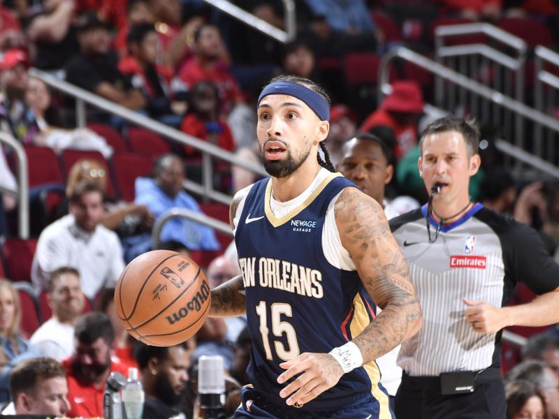 HOUSTON, TX - OCTOBER 15: Jose Alvarado #15 of the New Orleans Pelicans dribbles the ball during the game against the Houston Rockets during a NBA preseason game on October 15, 2024 at the Toyota Center in Houston, Texas. NOTE TO USER: User expressly acknowledges and agrees that, by downloading and or using this photograph, User is consenting to the terms and conditions of the Getty Images License Agreement. Mandatory Copyright Notice: Copyright 2024 NBAE (Photo by Logan Riely/NBAE via Getty Images)