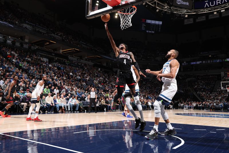 MINNEAPOLIS, MN -  FEBRUARY 4: Jalen Green #4 of the Houston Rockets drives to the basket during the game against the Minnesota Timberwolves on February 4, 2024 at Target Center in Minneapolis, Minnesota. NOTE TO USER: User expressly acknowledges and agrees that, by downloading and or using this Photograph, user is consenting to the terms and conditions of the Getty Images License Agreement. Mandatory Copyright Notice: Copyright 2024 NBAE (Photo by David Sherman/NBAE via Getty Images)