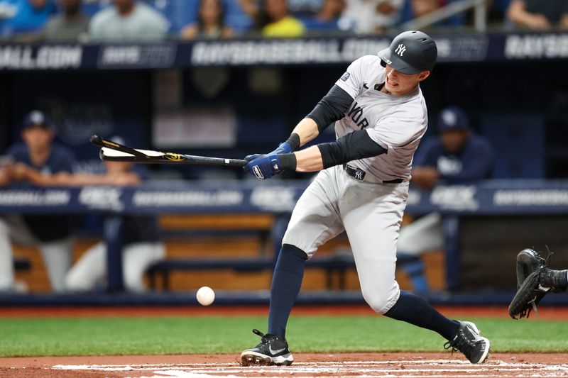 Jul 10, 2024; St. Petersburg, Florida, USA;  New York Yankees first baseman Ben Rice (93) breaks his bat on a ground ball against the Tampa Bay Rays in the first inning at Tropicana Field. Mandatory Credit: Nathan Ray Seebeck-USA TODAY Sports