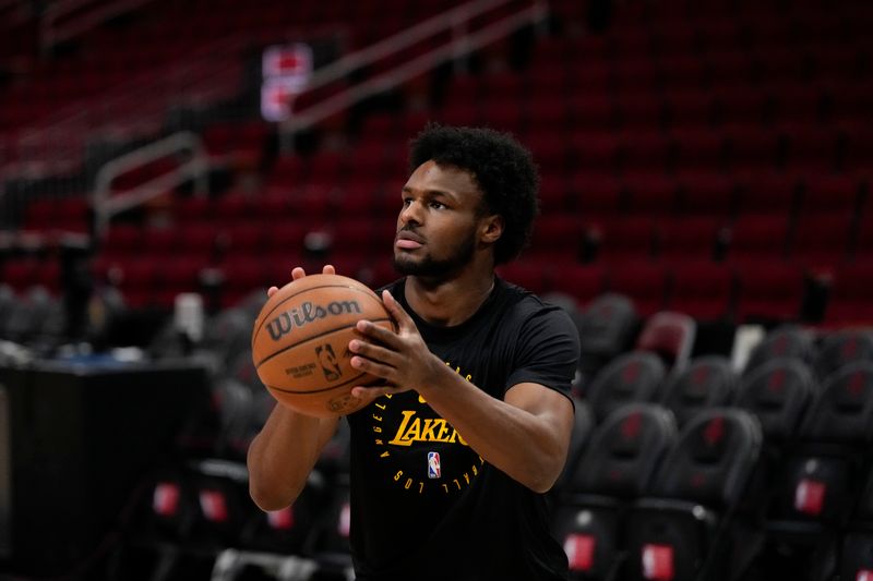 HOUSTON, TX - JANUARY 5:  Bronny James #9 of the Los Angeles Lakers warms up before the game against the Houston Rockets on January 5, 2025 at the Toyota Center in Houston, Texas. NOTE TO USER: User expressly acknowledges and agrees that, by downloading and or using this photograph, User is consenting to the terms and conditions of the Getty Images License Agreement. Mandatory Copyright Notice: Copyright 2025 NBAE (Photo by Kevin M.Cox/NBAE via Getty Images)