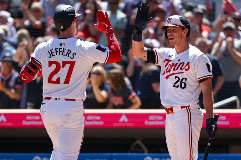 May 5, 2024; Minneapolis, Minnesota, USA; Minnesota Twins Ryan Jeffers (27) celebrates his home run with Max Kepler (26) against the Boston Red Sox during the third inning at Target Field. Mandatory Credit: Matt Krohn-USA TODAY Sports