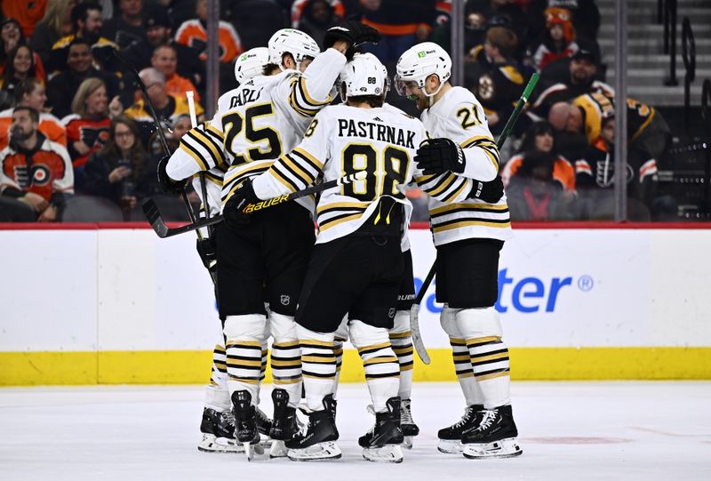 Jan 27, 2024; Philadelphia, Pennsylvania, USA; Boston Bruins right wing David Pastrnak (88) celebrates with teammates after scoring a goal against the Philadelphia Flyers in the first period at Wells Fargo Center. Mandatory Credit: Kyle Ross-USA TODAY Sports