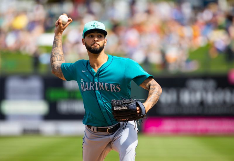 Mar 18, 2024; Surprise, Arizona, USA; Seattle Mariners pitcher Tyson Miller against the Texas Rangers during a spring training baseball game at Surprise Stadium. Mandatory Credit: Mark J. Rebilas-USA TODAY Sports