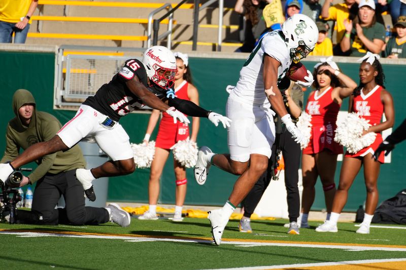 Nov 4, 2023; Waco, Texas, USA;  Baylor Bears tight end Drake Dabney (89) makes a touchdown catch against Houston Cougars defensive back Malik Fleming (15) during the second half at McLane Stadium. Mandatory Credit: Chris Jones-USA TODAY Sports