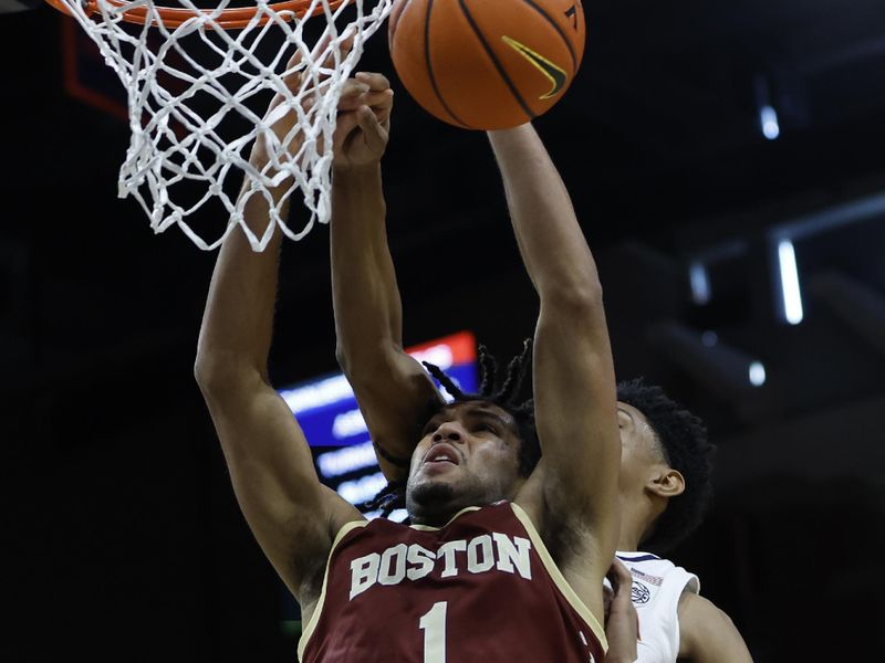 Jan 28, 2023; Charlottesville, Virginia, USA; Virginia Cavaliers guard Ryan Dunn (13) blocks the shot of Boston College Eagles forward T.J. Bickerstaff (1) in the first half at John Paul Jones Arena. Mandatory Credit: Geoff Burke-USA TODAY Sports