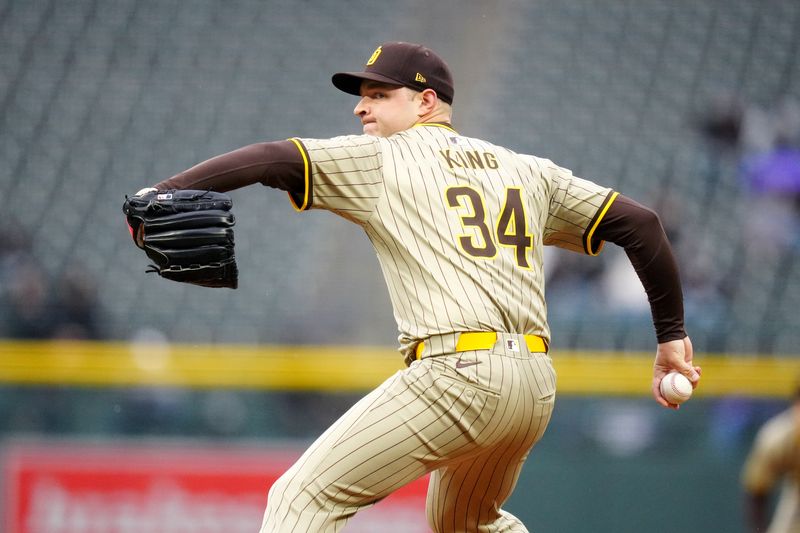 Apr 23, 2024; Denver, Colorado, USA; San Diego Padres starting pitcher Michael King (34) delivers a pitch in the first inning against the Colorado Rockies at Coors Field. Mandatory Credit: Ron Chenoy-USA TODAY Sports