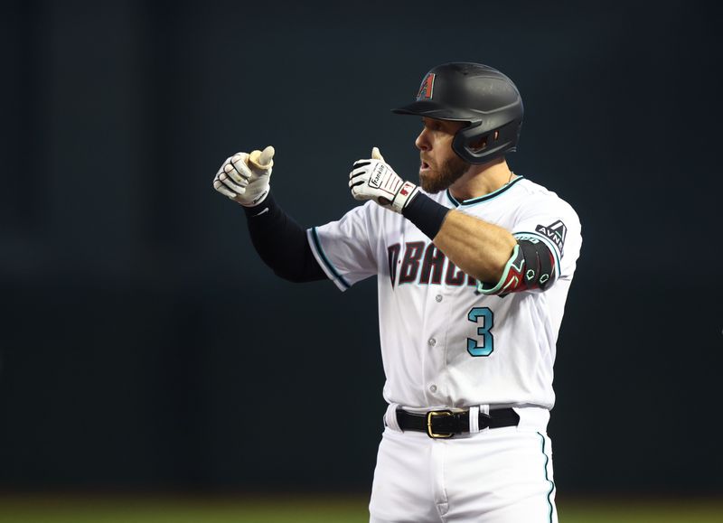 Aug 27, 2023; Phoenix, Arizona, USA; Arizona Diamondbacks third baseman Evan Longoria celebrates after hitting a second inning single against the Cincinnati Reds at Chase Field. Mandatory Credit: Mark J. Rebilas-USA TODAY Sports