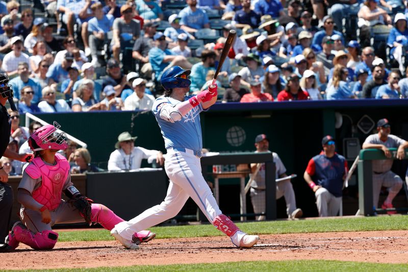May 11, 2025; Kansas City, Missouri, USA;  Kansas City Royals designated hitter Vinnie Pasquantino (9) flys out to center field at Kauffman Stadium. Mandatory Credit: Gary Rohman-Imagn Images