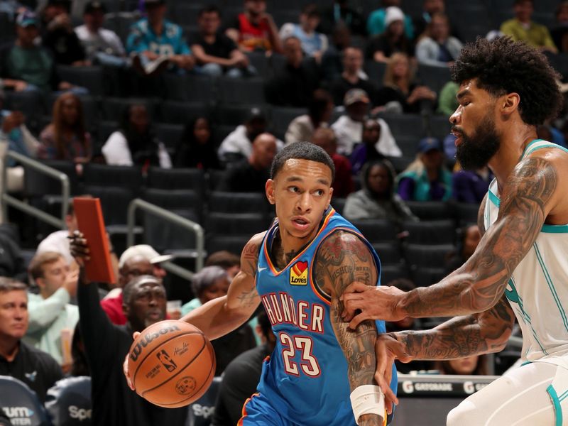 CHARLOTTE, NC - OCTOBER 15: Tre Mann #23 of the Oklahoma City Thunder drives to the basket during the game against the Charlotte Hornets on October 15, 2023 at Spectrum Center in Charlotte, North Carolina. NOTE TO USER: User expressly acknowledges and agrees that, by downloading and or using this photograph, User is consenting to the terms and conditions of the Getty Images License Agreement. Mandatory Copyright Notice: Copyright 2023 NBAE (Photo by Kent Smith/NBAE via Getty Images)