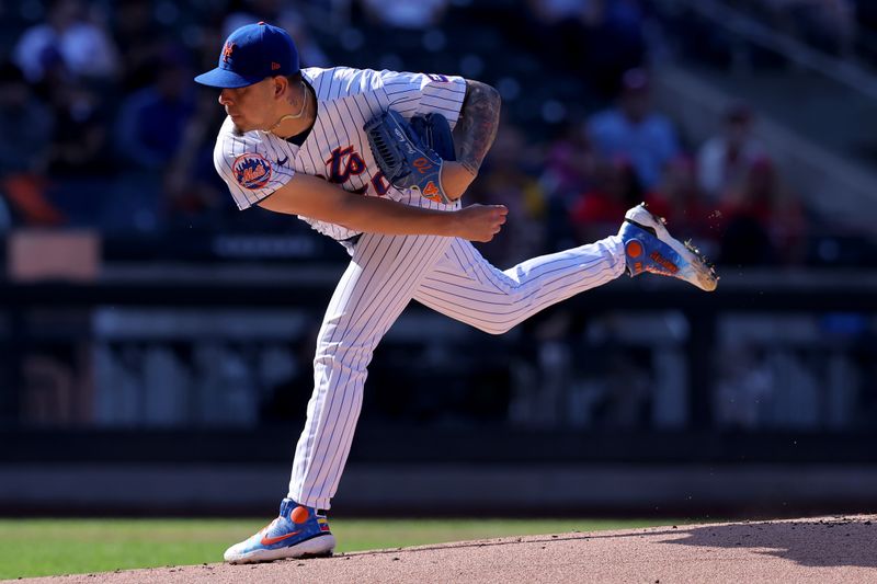 Oct 1, 2023; New York City, New York, USA; New York Mets starting pitcher Jose Butto (70) follows through on a pitch against the Philadelphia Phillies during the first inning at Citi Field. Mandatory Credit: Brad Penner-USA TODAY Sports