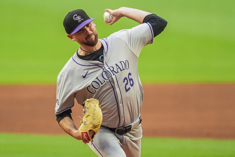 Sep 5, 2024; Cumberland, Georgia, USA; Colorado Rockies starting pitcher Austin Gomber (26) pitches against the Atlanta Braves during the first inning at Truist Park. Mandatory Credit: Dale Zanine-Imagn Images