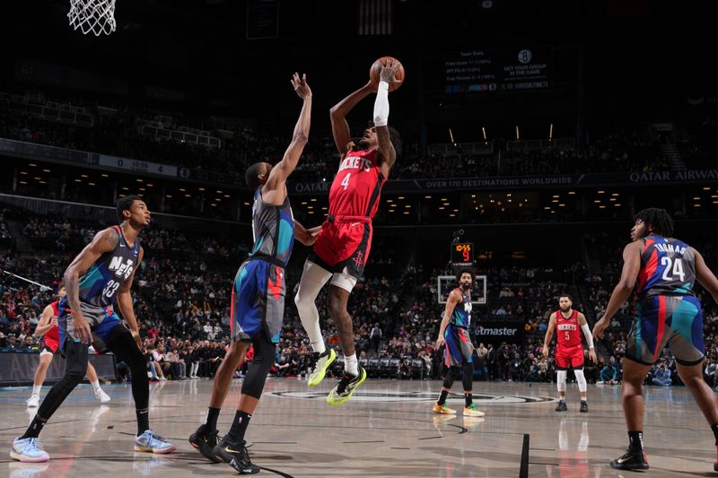 BROOKLYN, NY - JANUARY 27: Jalen Green #4 of the Houston Rockets drives to the basket during the game against the Brooklyn Nets on January 27, 2024 at Barclays Center in Brooklyn, New York. NOTE TO USER: User expressly acknowledges and agrees that, by downloading and or using this Photograph, user is consenting to the terms and conditions of the Getty Images License Agreement. Mandatory Copyright Notice: Copyright 2024 NBAE (Photo by Jesse D. Garrabrant/NBAE via Getty Images)