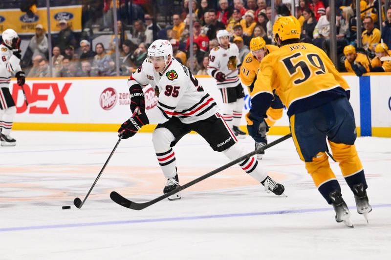 Feb 26, 2026; Nashville, Tennessee, USA;  Chicago Blackhawks right wing Ilya Mikheyev (95) skates with the puck against the Nashville Predators during the second period at Bridgestone Arena. Mandatory Credit: Steve Roberts-Imagn Images