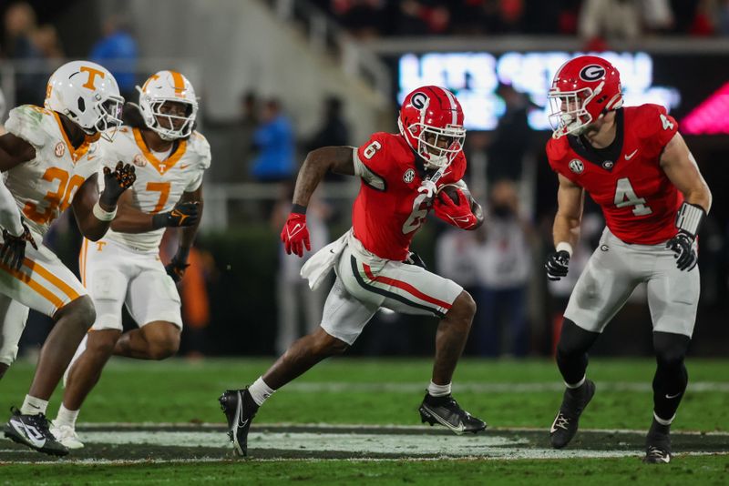 Nov 16, 2024; Athens, Georgia, USA; Georgia Bulldogs wide receiver Dominic Lovett (6) runs after a catch against the Tennessee Volunteers in the first quarter at Sanford Stadium. Mandatory Credit: Brett Davis-Imagn Images
