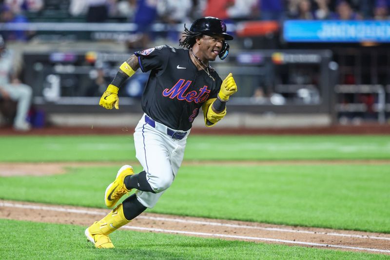 Sep 19, 2024; New York City, New York, USA;  New York Mets shortstop Luisangel Acuña (2) hits an RBI triple in the seventh inning against the Philadelphia Phillies at Citi Field. Mandatory Credit: Wendell Cruz-Imagn Images