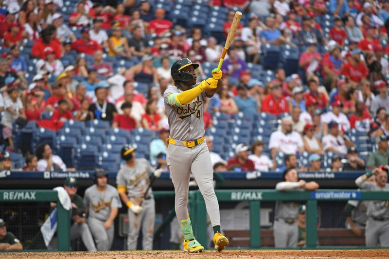 Jul 14, 2024; Philadelphia, Pennsylvania, USA; Oakland Athletics outfielder Lawrence Butler (4) watches his third home run of the game against the Philadelphia Phillies during the seventh inning at Citizens Bank Park. Mandatory Credit: Eric Hartline-USA TODAY Sports