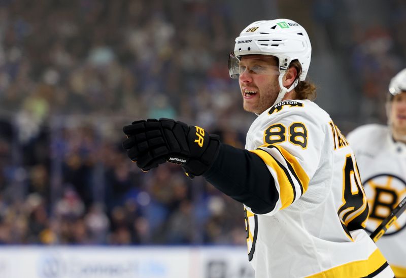 Dec 27, 2025; Buffalo, New York, USA;  Boston Bruins right wing David Pastrnak (88) reacts after scoring a goal during the first period against the Buffalo Sabres at KeyBank Center. Mandatory Credit: Timothy T. Ludwig-Imagn Images