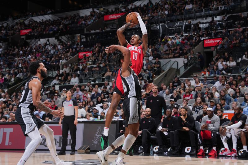 SAN ANTONIO, TX - MARCH 12: Jabari Smith Jr. #10 of the Houston Rockets shoots the ball during the game against the San Antonio Spurs on March 12, 2024 at the Frost Bank Center in San Antonio, Texas. NOTE TO USER: User expressly acknowledges and agrees that, by downloading and or using this photograph, user is consenting to the terms and conditions of the Getty Images License Agreement. Mandatory Copyright Notice: Copyright 2024 NBAE (Photos by Jesse D. Garrabrant/NBAE via Getty Images)