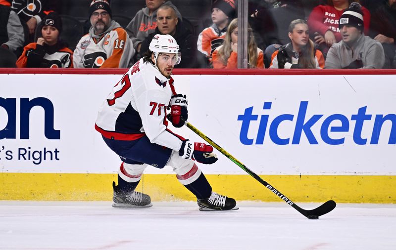 Dec 14, 2023; Philadelphia, Pennsylvania, USA; Washington Capitals right wing T.J. Oshie (77) controls the puck against the Philadelphia Flyers in overtime at Wells Fargo Center. Mandatory Credit: Kyle Ross-USA TODAY Sports