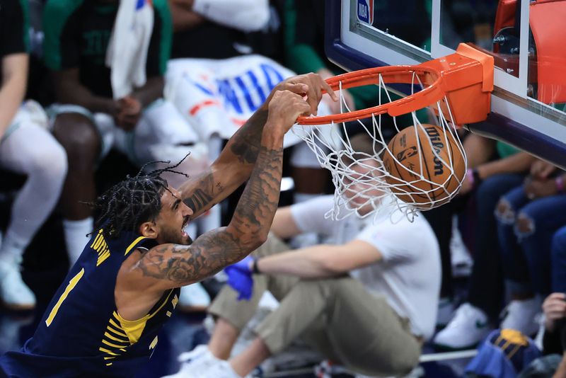 INDIANAPOLIS, INDIANA - OCTOBER 30: Obi Toppin #1 of the Indiana Pacers dunks the ball during the second half against the Boston Celtics at Gainbridge Fieldhouse on October 30, 2024 in Indianapolis, Indiana. NOTE TO USER: User expressly acknowledges and agrees that, by downloading and or using this photograph, User is consenting to the terms and conditions of the Getty Images License Agreement. (Photo by Justin Casterline/Getty Images)