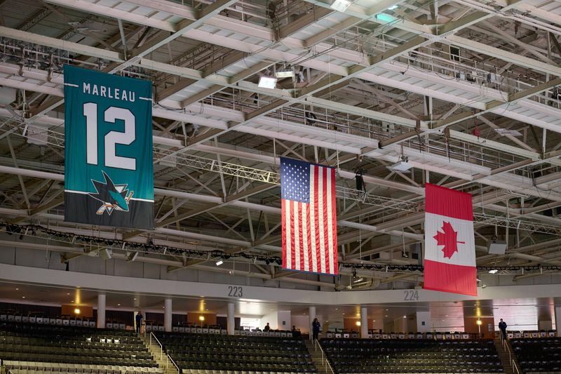 Mar 9, 2024; San Jose, California, USA; Flags of the United States and Canada are seen in the rafters before the game between the San Jose Sharks and the Ottawa Senators at SAP Center at San Jose. Mandatory Credit: Robert Edwards-USA TODAY Sports