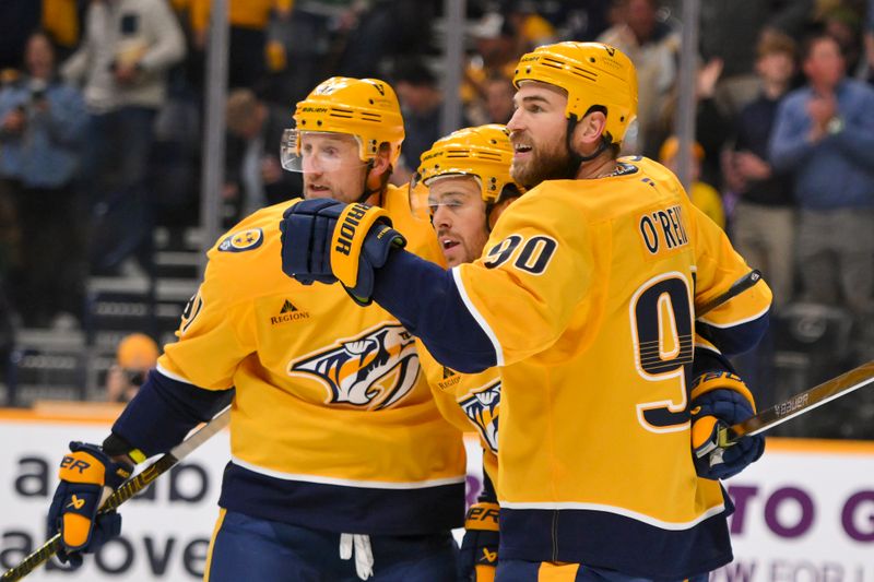 Oct 26, 2025; Nashville, Tennessee, USA;  Nashville Predators center Steven Stamkos (91) celebrates with his teammates after scoring a goal against the Dallas Stars during the first period at Bridgestone Arena. Mandatory Credit: Steve Roberts-Imagn Images