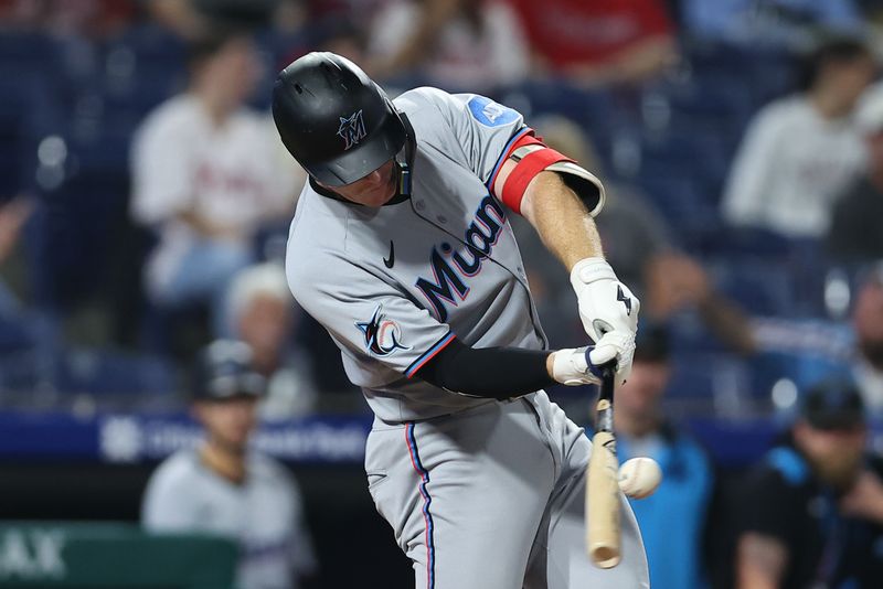 Sep 24, 2025; Philadelphia, Pennsylvania, USA; Miami Marlins first base Eric Wagaman (33) hits an RBI single during the second inning against the Philadelphia Phillies at Citizens Bank Park. Mandatory Credit: Bill Streicher-Imagn Images