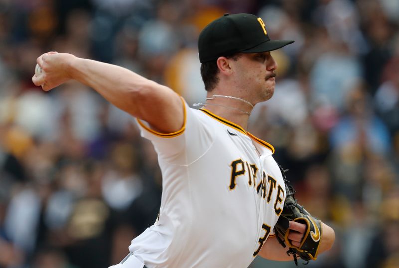 May 11, 2024; Pittsburgh, Pennsylvania, USA;  Pittsburgh Pirates starting pitcher Paul Skenes (30) delivers a pitch in his major league debut against the Chicago Cubs during the first inning at PNC Park. Mandatory Credit: Charles LeClaire-USA TODAY Sports