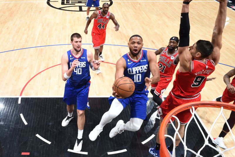 LOS ANGELES, CA - MARCH 27: Eric Gordon #10 of the LA Clippers drives to the basket during the game against the Chicago Bulls on March 27, 2023 at Crypto.Com Arena in Los Angeles, California. NOTE TO USER: User expressly acknowledges and agrees that, by downloading and/or using this Photograph, user is consenting to the terms and conditions of the Getty Images License Agreement. Mandatory Copyright Notice: Copyright 2023 NBAE (Photo by Adam Pantozzi/NBAE via Getty Images)