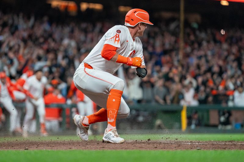 Jul 9, 2024; San Francisco, California, USA;  San Francisco Giants short stop Tyler Fitzgerald (49) celebrates after scoring against the Toronto Blue Jays during the ninth inning to end the game at Oracle Park. Mandatory Credit: Neville E. Guard-USA TODAY Sports