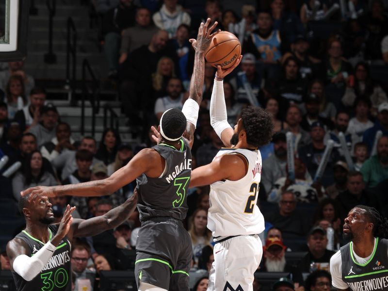 MINNEAPOLIS, MN -  NOVEMBER 1: Jaden McDaniels #3 of the Minnesota Timberwolves block during the game against the Denver Nuggets on November 1, 2024 at Target Center in Minneapolis, Minnesota. NOTE TO USER: User expressly acknowledges and agrees that, by downloading and or using this Photograph, user is consenting to the terms and conditions of the Getty Images License Agreement. Mandatory Copyright Notice: Copyright 2024 NBAE (Photo by David Sherman/NBAE via Getty Images)