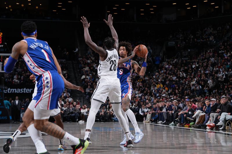 BROOKLYN, NY - MARCH 5: Kelly Oubre Jr. #9 of the Philadelphia 76ers passes the ball during the game against the Brooklyn Nets on March 5, 2024 at Barclays Center in Brooklyn, New York. NOTE TO USER: User expressly acknowledges and agrees that, by downloading and or using this Photograph, user is consenting to the terms and conditions of the Getty Images License Agreement. Mandatory Copyright Notice: Copyright 2024 NBAE (Photo by Jesse D. Garrabrant/NBAE via Getty Images)