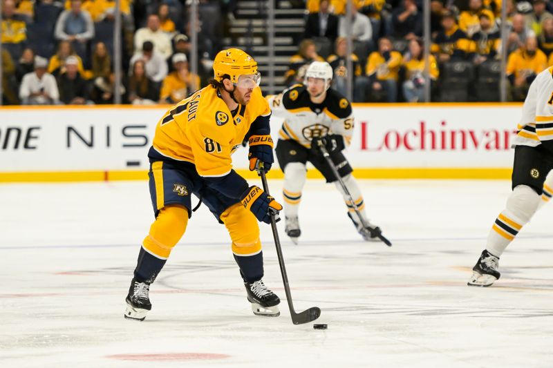 Oct 22, 2024; Nashville, Tennessee, USA;  Nashville Predators center Jonathan Marchessault (81) skates with the puck against against the Boston Bruins during the first period at Bridgestone Arena. Mandatory Credit: Steve Roberts-Imagn Images