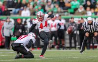 Western Kentucky Hilltoppers Grapple with Louisiana Tech Bulldogs in a Defensive Showdown