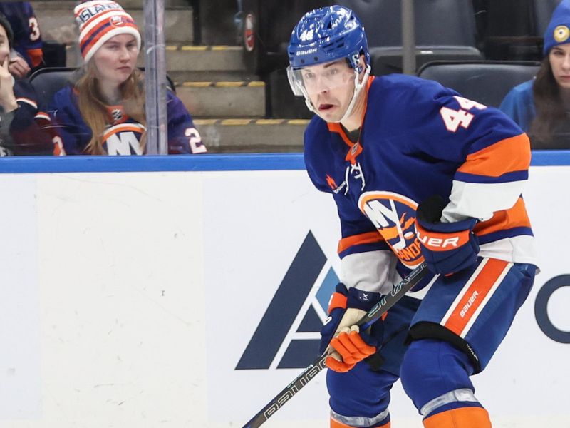 Mar 4, 2025; Elmont, New York, USA;  New York Islanders center Jean-Gabriel Pageau (44) controls the puck in the third period against the Winnipeg Jets at UBS Arena. Mandatory Credit: Wendell Cruz-Imagn Images