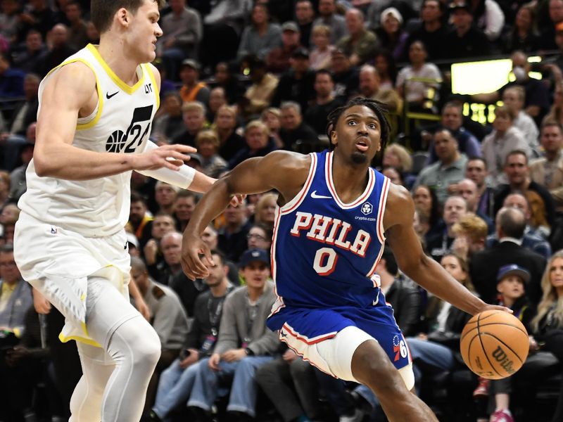 SALT LAKE CITY, UTAH - FEBRUARY 01: Tyrese Maxey #0 of the Philadelphia 76ers drives past Walker Kessler #24 of the Utah Jazz during the second half at Delta Center on February 01, 2024 in Salt Lake City, Utah. NOTE TO USER: User expressly acknowledges and agrees that, by downloading and or using this photograph, User is consenting to the terms and conditions of the Getty Images License Agreement. (Photo by Alex Goodlett/Getty Images)