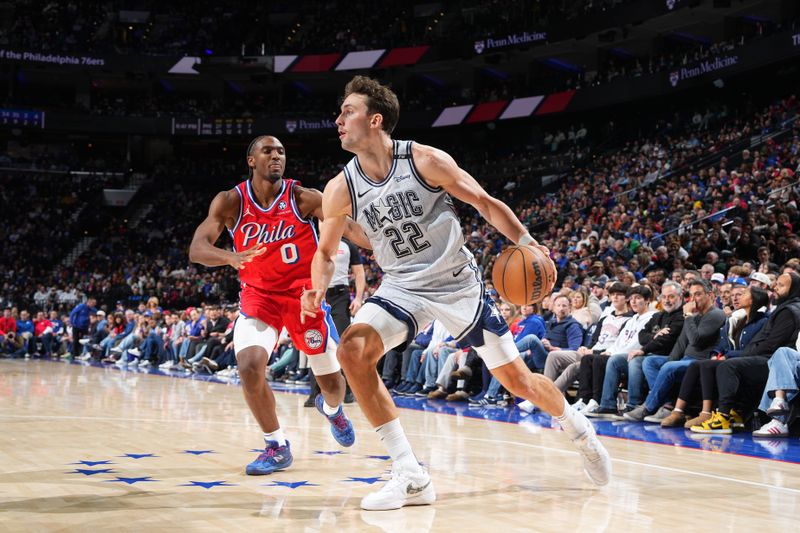 PHILADELPHIA, PA - DECEMBER 6: Franz Wagner #22 of the Orlando Magic dribbles the ball during the game against the Philadelphia 76ers on December 6, 2024 at the Wells Fargo Center in Philadelphia, Pennsylvania NOTE TO USER: User expressly acknowledges and agrees that, by downloading and/or using this Photograph, user is consenting to the terms and conditions of the Getty Images License Agreement. Mandatory Copyright Notice: Copyright 2024 NBAE (Photo by Jesse D. Garrabrant/NBAE via Getty Images)