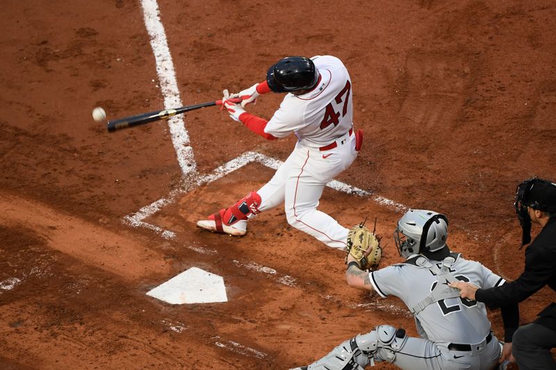 Sep 23, 2023; Boston, Massachusetts, USA; Boston Red Sox second baseman Enmanuel Valdez (47) hits a double during the fifth inning against the Chicago White Sox at Fenway Park. Mandatory Credit: Bob DeChiara-USA TODAY Sports