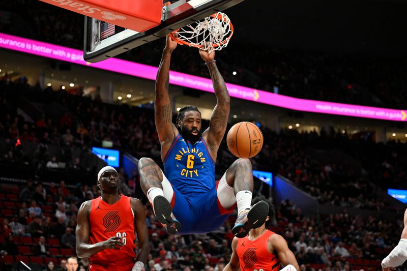 PORTLAND, OREGON - MARCH 23: DeAndre Jordan #6 of the Denver Nuggets dunks the ball during the first quarter of the game against the Portland Trail Blazers at the Moda Center on March 23, 2024 in Portland, Oregon. NOTE TO USER: User expressly acknowledges and agrees that, by downloading and or using this photograph, User is consenting to the terms and conditions of the Getty Images License Agreement. (Photo by Alika Jenner/Getty Images)