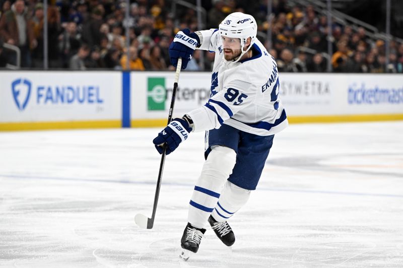 Nov 11, 2025; Boston, Massachusetts, USA; Toronto Maple Leafs defenseman Oliver Ekman-Larsson (95) takes a shot against the Boston Bruins during the second period at the TD Garden. Mandatory Credit: Brian Fluharty-Imagn Images