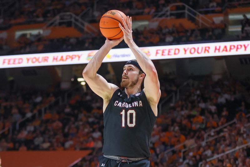 Feb 25, 2023; Knoxville, Tennessee, USA; South Carolina Gamecocks forward Hayden Brown (10) shoots a three pointer against the Tennessee Volunteers during the first half at Thompson-Boling Arena. Mandatory Credit: Randy Sartin-USA TODAY Sports