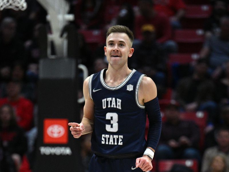 Jan 25, 2023; San Diego, California, USA; Utah State Aggies guard Steven Ashworth (3) gestures after a three-point basket during the second half against the San Diego State Aztecs at Viejas Arena. Mandatory Credit: Orlando Ramirez-USA TODAY Sports