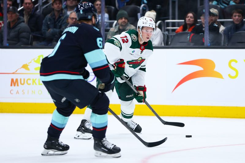 Jan 8, 2026; Seattle, Washington, USA; Minnesota Wild left wing Matt Boldy (12) looks to shoot in the third period against the Seattle Kraken at Climate Pledge Arena. Mandatory Credit: Kevin Ng-Imagn Images