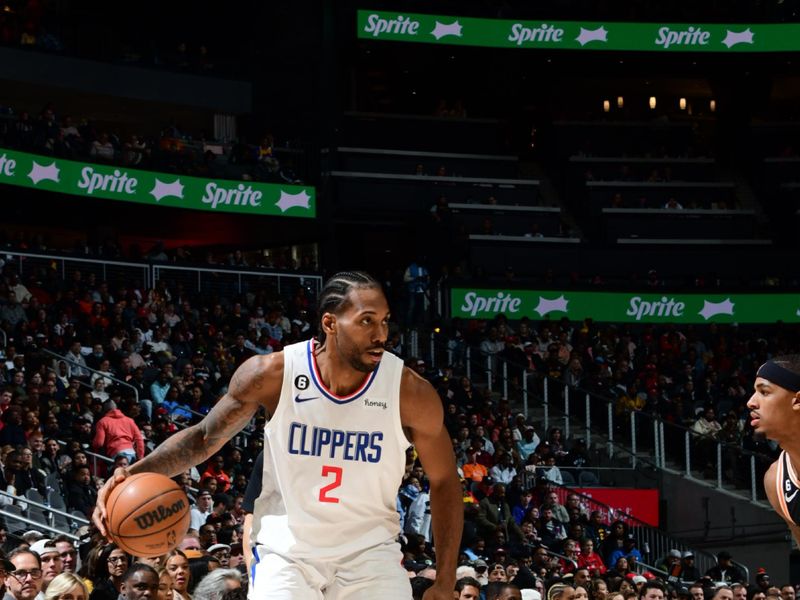 ATLANTA, GA - JANUARY 28: Kawhi Leonard #2 of the LA Clippers handles the ball against former San Antonio Spurs teammate Dejounte Murray #5 of the Atlanta Hawks on January 28, 2023 at State Farm Arena in Atlanta, Georgia.  NOTE TO USER: User expressly acknowledges and agrees that, by downloading and/or using this Photograph, user is consenting to the terms and conditions of the Getty Images License Agreement. Mandatory Copyright Notice: Copyright 2023 NBAE (Photo by Scott Cunningham/NBAE via Getty Images)