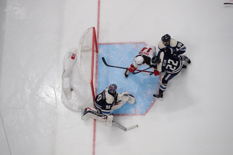 Jan 19, 2024; Columbus, Ohio, USA; New Jersey Devils right wing Nathan Bastian (14) scores a goal on a tip shot against the Columbus Blue Jackets during the third period at Nationwide Arena. Mandatory Credit: Russell LaBounty-USA TODAY Sports