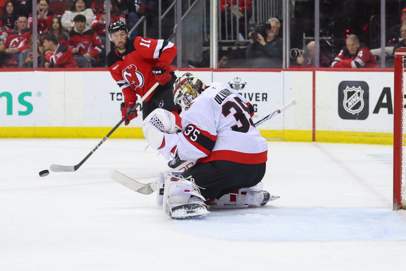 Mar 22, 2025; Newark, New Jersey, USA; Ottawa Senators goaltender Linus Ullmark (35) makes a save against the New Jersey Devils during the second period at Prudential Center. Mandatory Credit: Ed Mulholland-Imagn Images